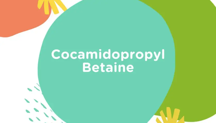 Kolorowe kształty i tekst "Cocamidopropyl Betaine". Ten składnik jest często używany w kosmetykach.